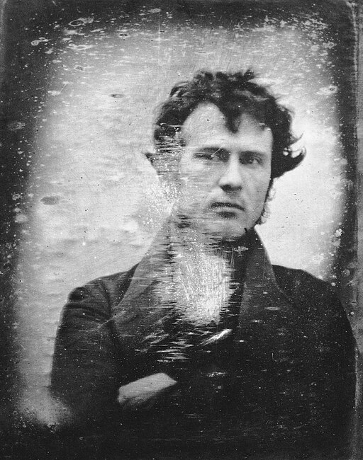 Self-portrait daguerreotype made by Robert Cornelius (1809 - 1893), probably in October or November 1839. Made with an improvised camera obscura. Exposure time around 10 minutes. Believed to be the first successful photographic self-portrait ever made in North America.