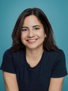 a woman smiling at camera